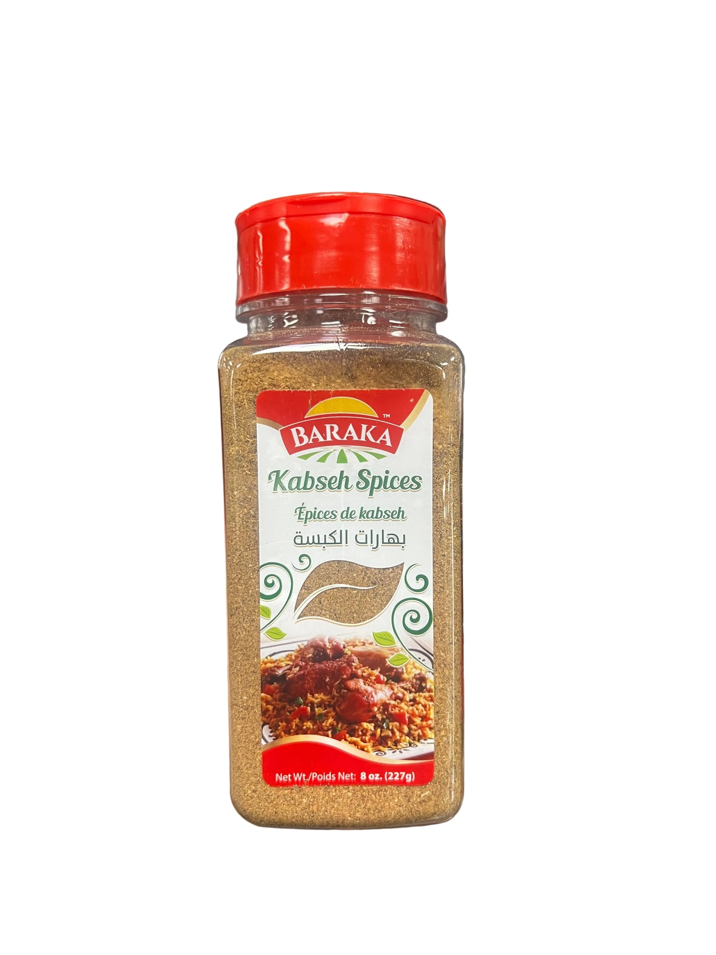 Hand holding a Baraka spice container with a blurred store shelf in the background