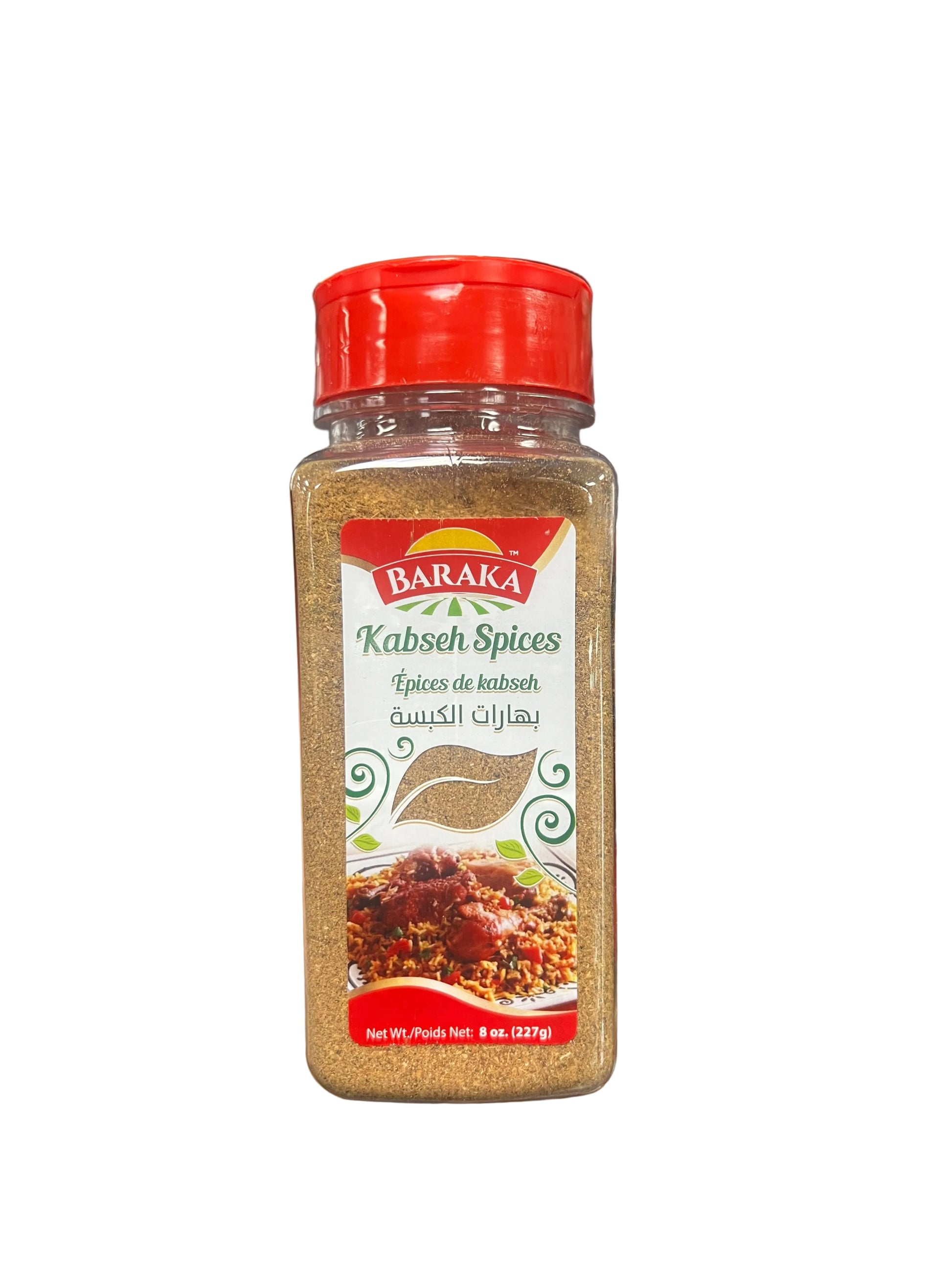 Hand holding a Baraka spice container with a blurred store shelf in the background