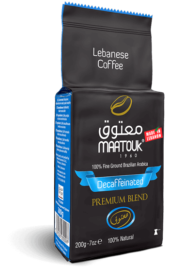 Maatouk decaffeinated coffee package on a black background